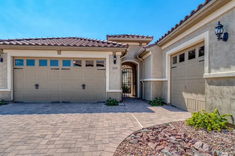 Garage door repair San Diego home weighing repair versus replacement